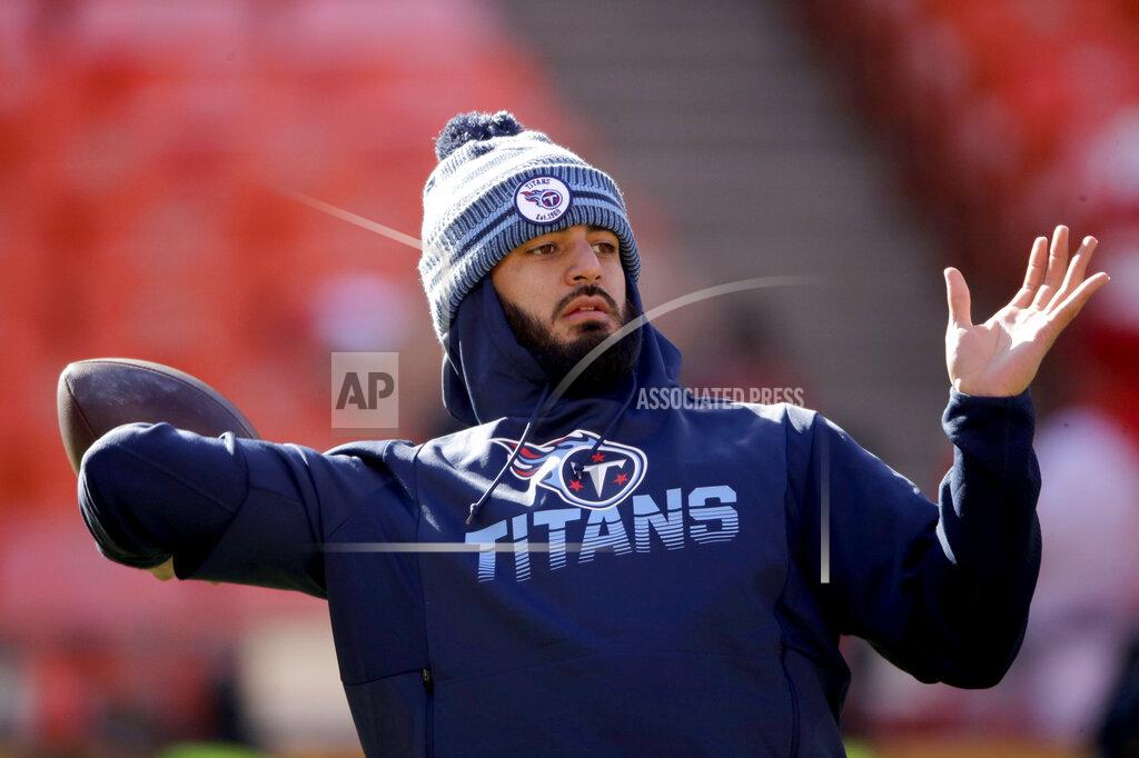 Charlie Riedel Tennessee Titans' quarterback Marcus Mariota warms up before the NFL AFC Championship football game against the Kansas City Chiefs Sunday, Jan. 19, 2020, in Kansas City, MO. (AP Photo/Charlie Riedel)