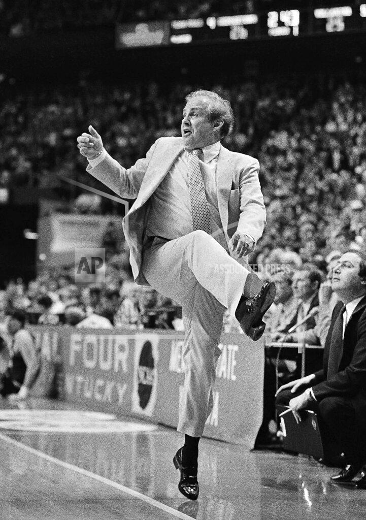 Bob Jordan FILE - In this April 1, 1985, file photo, Villanova coach Rollie Massimino is up on his toes during the NCAA college basketball Final Four championship game against Georgetown, in Lexington, Ky. Underdog Villanova, shooting 79 percent from the field, beat Georgetown 66-64. No one thought we could do it, but I did,” Villanova coach Rollie Massimino shouted afterward. (AP Photo/Bob Jordan, File)