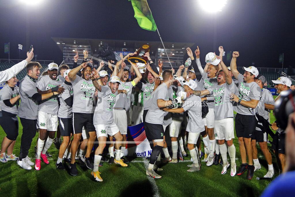 Karl B Deblaker Marshall celebrates winning the NCAA College Cup championship soccer match over Indiana in Cary, N.C., Monday, May 17, 2021. (AP Photo/Karl B DeBlaker)