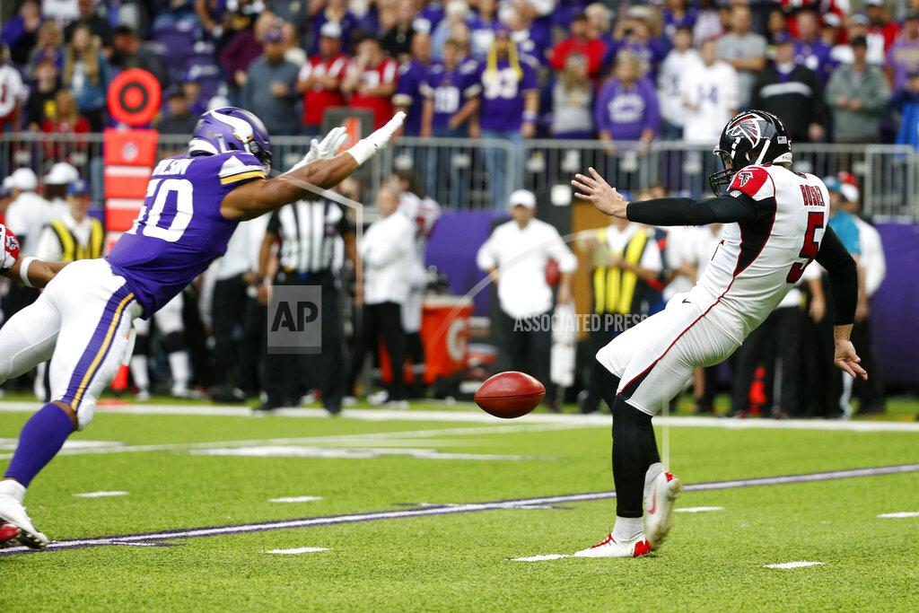 Bruce Kluckhohn Minnesota Vikings linebacker Eric Wilson, left, blocks a punt by Atlanta Falcons punter Matt Bosher during the first half of an NFL football game, Sunday, Sept. 8, 2019, in Minneapolis. (AP Photo/Bruce Kluckhohn)