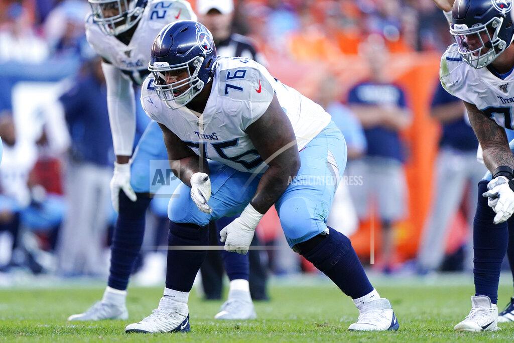 Jack Dempsey FILE - In this Oct. 13, 2019, file photo, Tennessee Titans offensive guard Rodger Saffold gets set at the line of scrimmage during the second half of an NFL football game against the Denver Broncos in Denver. Titans already are way ahead of where they were a year ago. (AP Photo/Jack Dempsey, File)