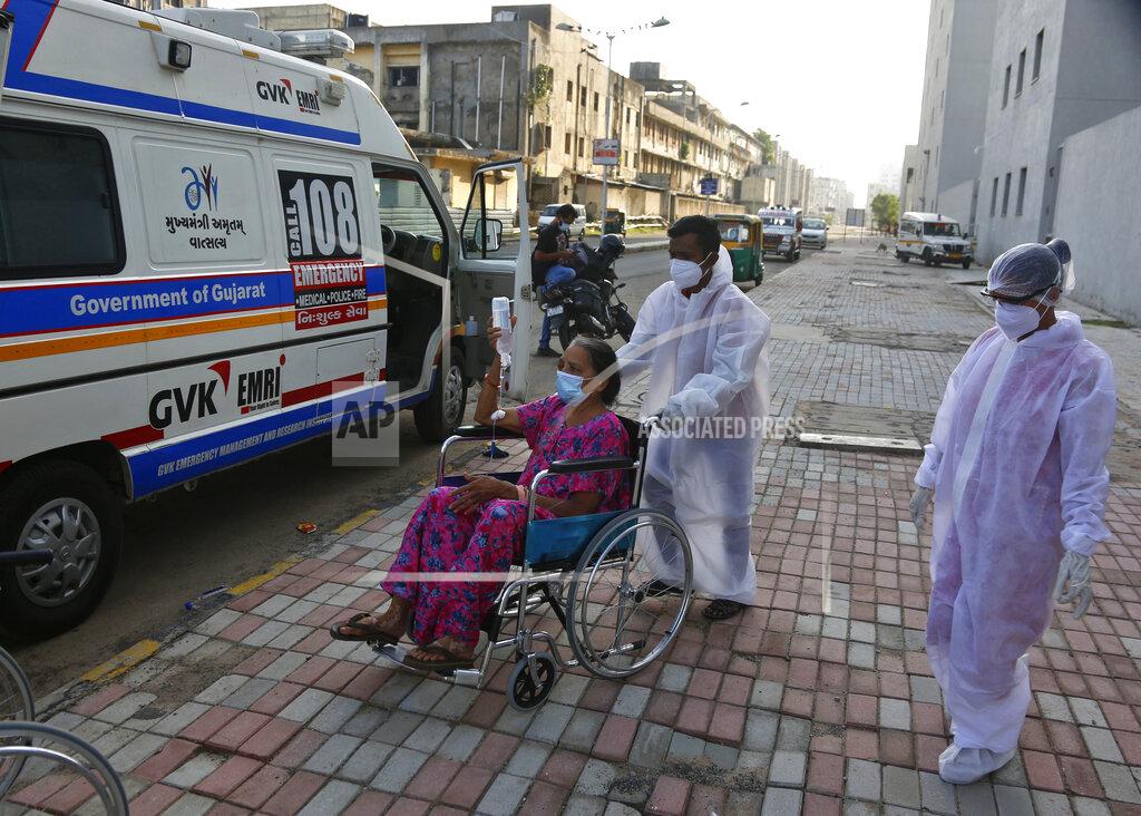 Ajit Solanki Paramedics shift a patient infected with black fungus to Mucormycosis ward of a government hospital in Ahmedabad, India, Friday, May 21, 2021. India's confirmed coronavirus cases and deaths remained below record levels in the last 24 hours, but authorities are worried about fungal infection that attacks those with weak immune systems. (AP Photo/Ajit Solanki)