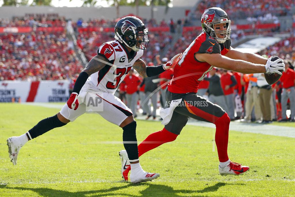Mark Lomoglio Tampa Bay Buccaneers tight end Cameron Brate (84) beats Atlanta Falcons free safety Ricardo Allen (37) to the endzone to score on a 2-yard touchdown reception during the first half of an NFL football game Sunday, Dec. 29, 2019, in Tampa, Fla. (AP Photo/Mark LoMoglio)
