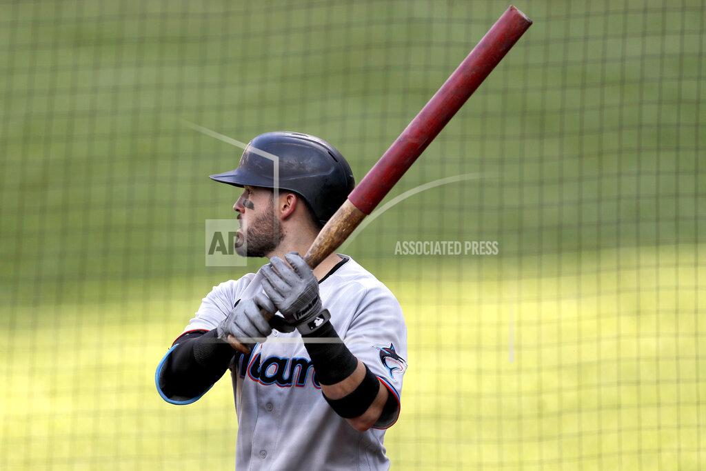 Julio Cortez Miami Marlins' Eddy Alvarez holds a weighted bat as he stands at the on deck circle during the second inning in game one of a baseball double-header against the Baltimore Orioles, Wednesday, Aug. 5, 2020, in Baltimore. (AP Photo/Julio Cortez)