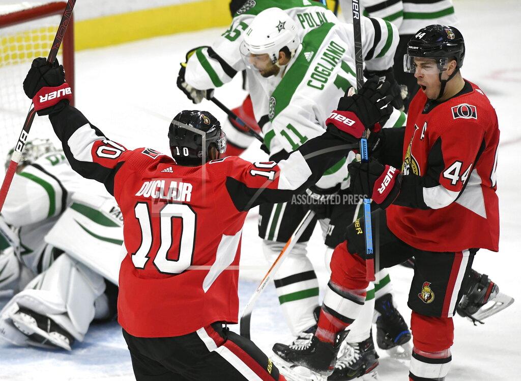 Justin Tang Ottawa Senators centre Jean-Gabriel Pageau (44) celebrates a goal against the Dallas Stars with left wing Anthony Duclair (10) during the first period of an NHL hockey game Sunday, Feb. 16, 2020, in Ottawa, Ontario. (Justin Tang/The Canadian Press via AP)
