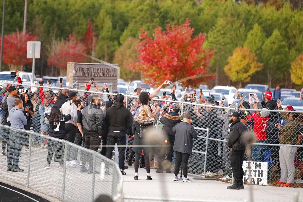 Todd Kirkland Free agent quarterback Colin Kaepernick greets fans after a workout for NFL football scouts and media, Saturday, Nov. 16, 2019, in Riverdale, Ga. (AP Photo/Todd Kirkland)