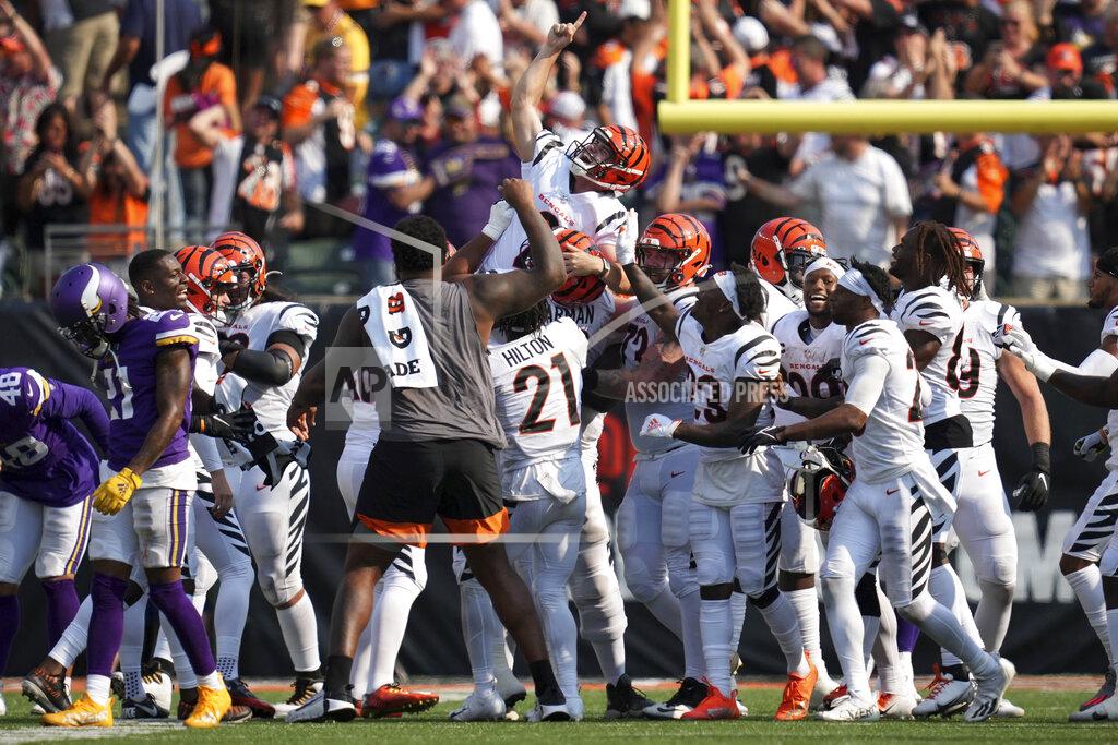 Anthony Souffle Cincinnati Bengals kicker Evan McPherson (2) is hoisted atop teammates' shoulders after he made a winning field goal to best the Minnesota Vikings in overtime of an NFL football game Sunday, Sept. 12, 2021, in Cincinnati. (Andrew Souffle/Star Tribune via AP)