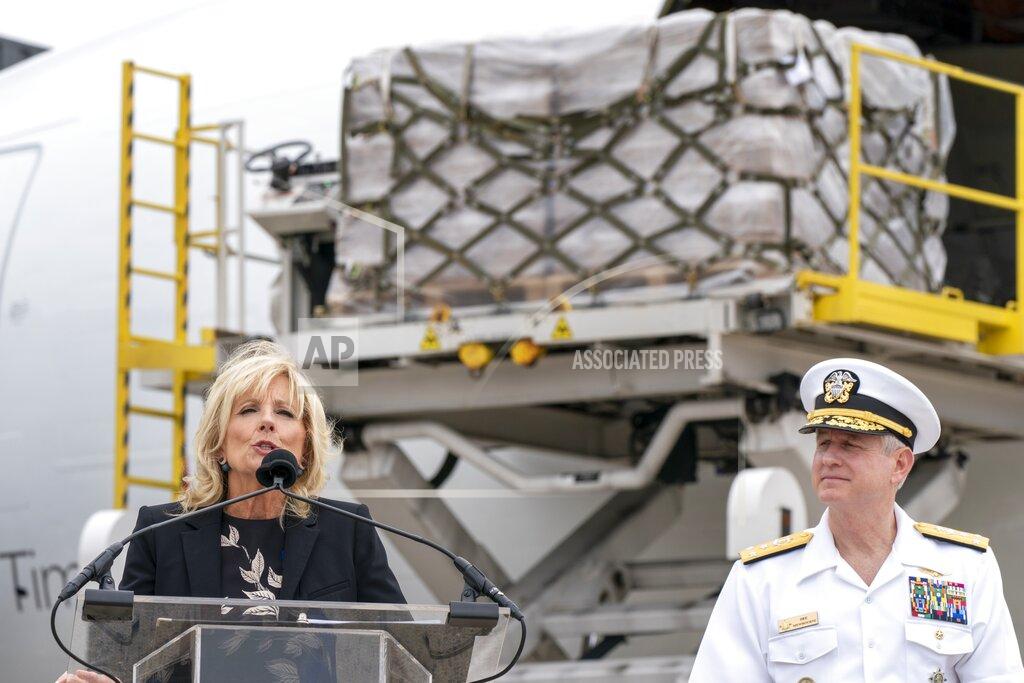 Jacquelyn Martin First lady Jill Biden, speaks next to Vice Admiral Dee Mewbourne, Deputy Commander of the U.S. Transportation Command, after a Fedex Express cargo plane carrying 100,000 pounds of baby formula arrived at Washington Dulles International Airport, Wednesday, May 25, 2022, in Chantilly, Va.(AP Photo/Jacquelyn Martin)