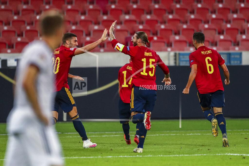 Matthias Schrader Spain players celebrate after scoring during the UEFA Nations League soccer match against Germany at the Mercedes-Benz Arena stadium in Stuttgart, Germany, Thursday, Sept. 3, 2020. (AP Photo/Matthias Schrader)