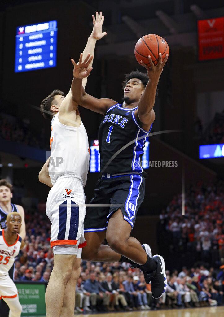 Andrew Shurtleff Duke center Vernon Carey Jr. (1) shoots next to Virginia center Francisco Caffaro (22) during an NCAA college basketball game Saturday, Feb. 29, 2020, in Charlottesville, Va. (AP Photo/Andrew Shurtleff)