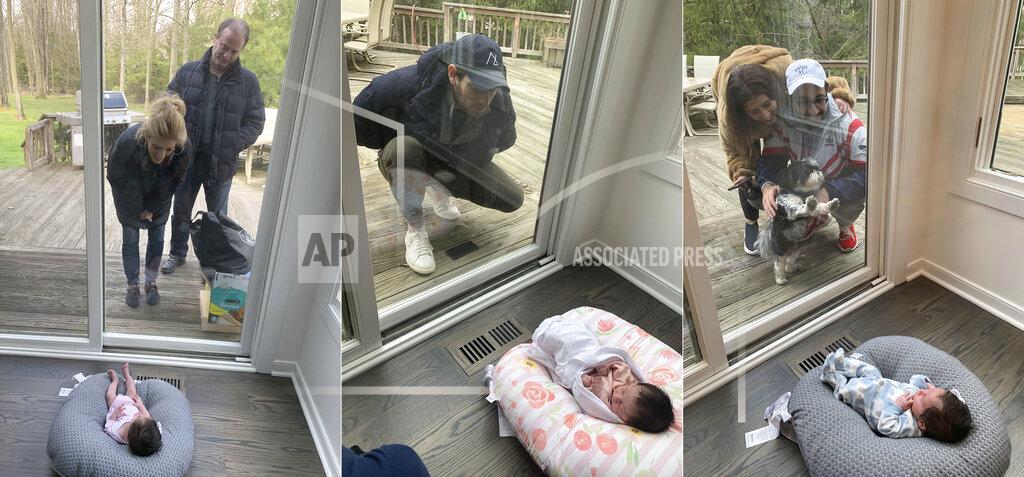 Jen Guyuron This combination of photos shows Suzy and Ricky Stone visiting with their granddaughter Gigi Guyuron through a window of their daughter Jen Guyuron’s home on April 18, 2020, in Cleveland, Ohio, left, Guyuron's brother Bryan Stone visiting on March 21, 2020, center, and Jen Charet and Jason Charet visiting with Gigi on April 23. Pregnancy, birth and life with a newborn in the middle of a pandemic has brought on high anxiety, ever-shifting hospital protocols and intense isolation for many of the millions of women who have done it around the world. (Jen Guyuron via AP)