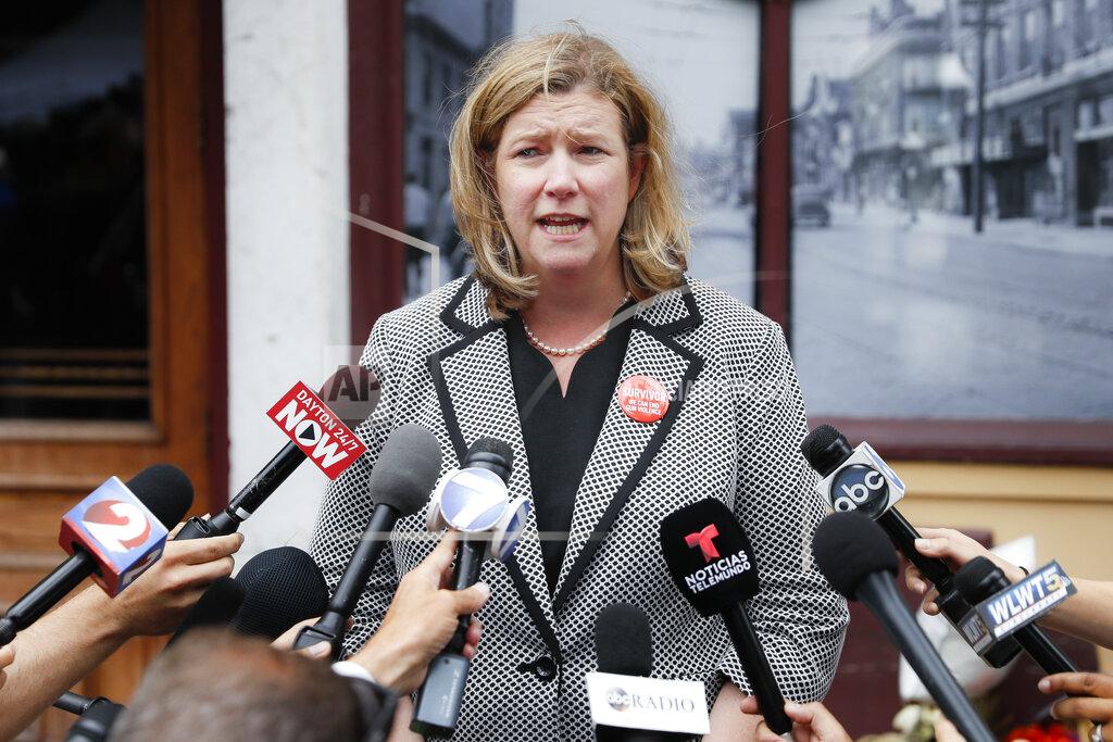 John Minchillo FILE— In this Aug. 6, 2019 file photo, Dayton, Ohio, Mayor Nan Whaley speaks to members of the media outside Ned Peppers bar in the Oregon in Dayton, Ohio. Whaley announced Monday April 19, 2021, she will try to unseat Ohio's Republican governor after her effort to work with him on gun reforms in the aftermath of a mass shooting in her city stalled. (AP Photo/John Minchillo, File)