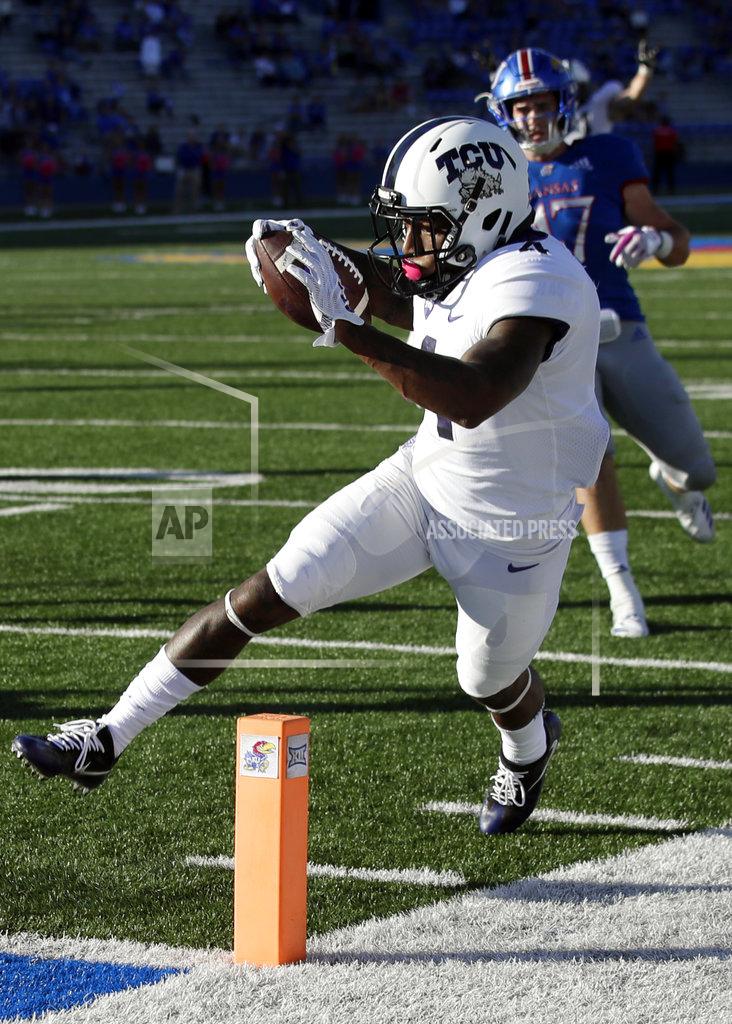 Orlin Wagner TCU wide receiver Taye Barber (4) is ruled out of bounds before crossing the goal line in front of Kansas linebacker Keith Loneker Jr. (47) during the second half of an NCAA college football game in Lawrence, Kan., Saturday, Oct. 27, 2018. (AP Photo/Orlin Wagner)