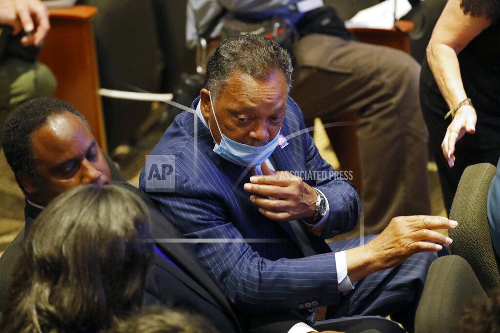 Julio Cortez The Rev. Jesse Jackson talks with others in at North Central University Thursday, June 4, 2020, before a memorial service for George Floyd in Minneapolis. (AP Photo/Julio Cortez)