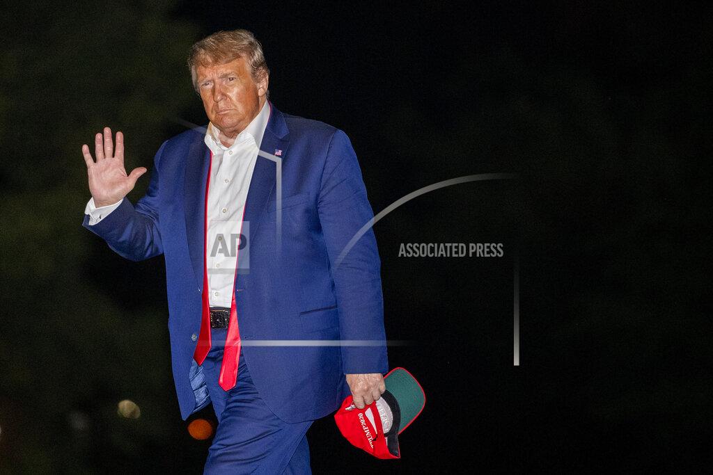 Patrick Semansky President Donald Trump walks on the South Lawn of the White House in Washington, early Sunday, June 21, 2020, after stepping off Marine One as he returns from a campaign rally in Tulsa, Okla. (AP Photo/Patrick Semansky)