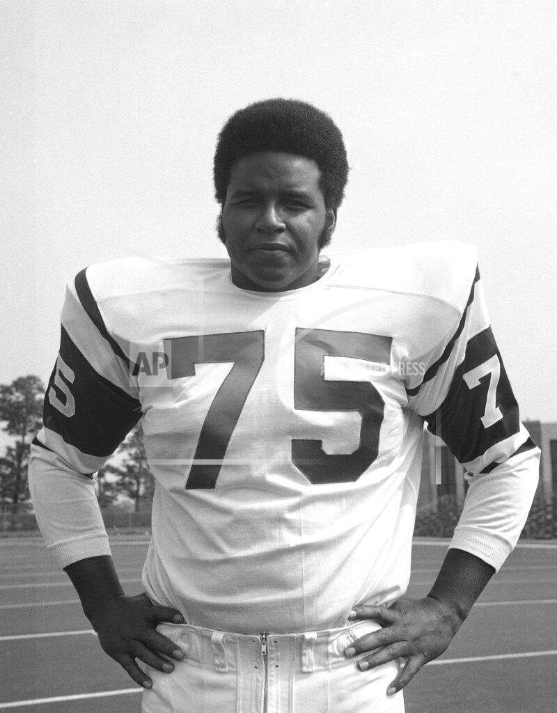 Uncredited FILE - This is an August 1970 file photo showing New York Jets NFL football player Winston Hill. The 6-foot-4, 270-pound Hill certainly was easy to like off the field because of his affable, teddy bear-like personality. He also was a fierce and dependable presence on it. The late Hill, who died in 2016, was posthumously selected last year for the centennial class of the Pro Football Hall of Fame. (AP Photo/File)