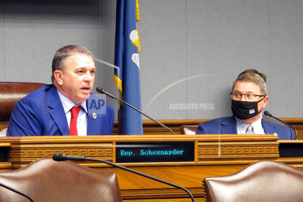 Melinda Deslatte House Speaker Clay Schexnayder, R-Gonzales, left, asks questions during a meeting of Louisiana's income forecasting panel, the Revenue Estimating Conference, while Senate President Page Cortez, R-Lafayette, listens on Tuesday, Jan. 19, 2021, in Baton Rouge, La. (AP Photo/Melinda Deslatte)