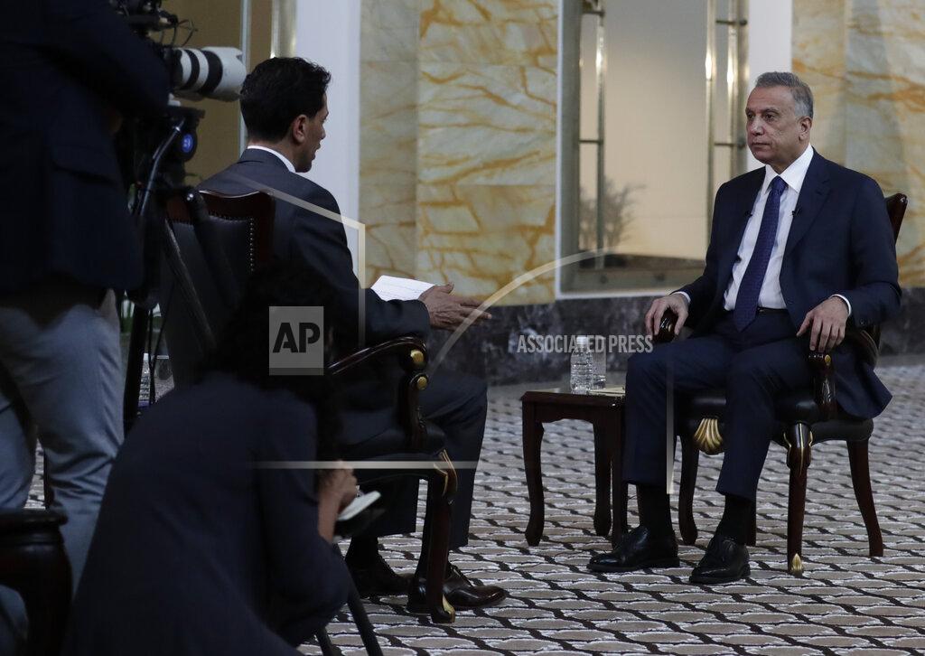 Khalid Mohammed Iraqi Prime Minister Mustafa al-Kadhimi sits during an interview with The Associated Press in Baghdad, Iraq, Friday, July 23, 2021. (AP Photo/Khalid Mohammed)