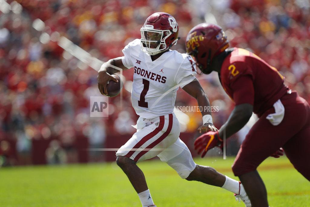 Matthew Putney Oklahoma quarterback Kyler Murray, center, runs the ball as he is chased to the sidelines by Iowa State linebacker Willie Harvey, right, during the second half of an NCAA college football game, Saturday, Sept. 15, 2018, in Ames, Iowa. Oklahoma won 37-27. (AP Photo/Matthew Putney)