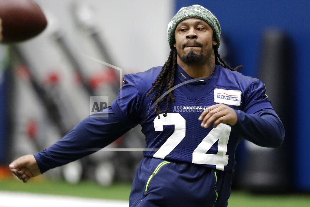 Ted S. Warren Seattle Seahawks running back Marshawn Lynch warms up for NFL football practice, Friday, Dec. 27, 2019, in Renton, Wash. (AP Photo/Ted S. Warren)