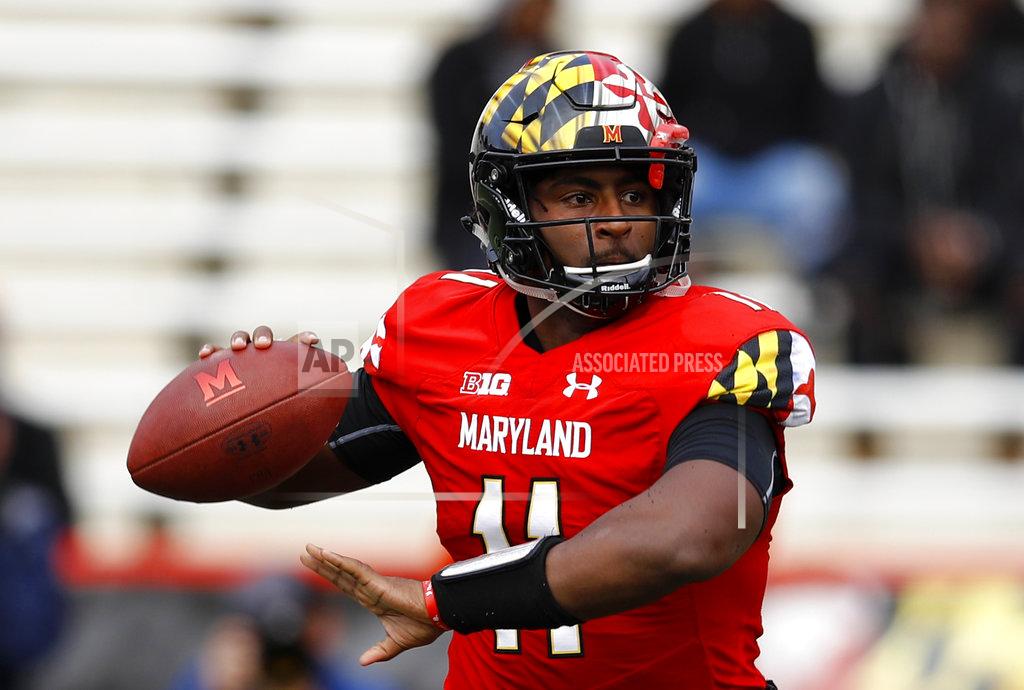 Patrick Semansky Maryland quarterback Kasim Hill throws to a receiver in the first half of an NCAA college football game against Illinois, Saturday, Oct. 27, 2018, in College Park, Md. (AP Photo/Patrick Semansky)