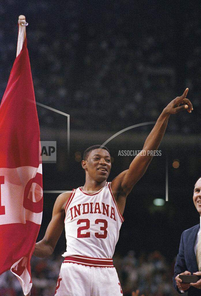 Anonymous FILE - In this March 30, 1987, file photo, Indiana's Keith Smart gives the number one sign after Indiana won the NCAA college basketball championship against Syracuse in New Orleans. Indiana defeated Syracuse 74-73. (AP Photo/File)