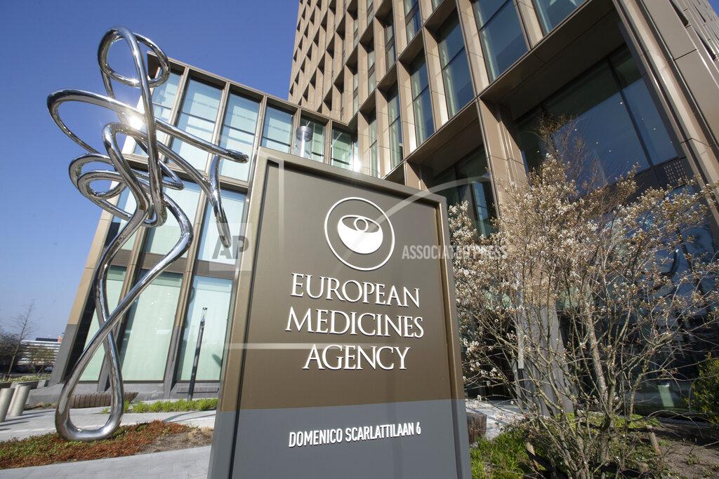 Peter Dejong FILE - Exterior view of the European Medicines Agency, EMA, in Amsterdam's business district, Netherlands, Tuesday, April 20, 2021. EMA's human medicines committee (CHMP) has recommended granting an extension of indication for the COVID-19 vaccine Comirnaty to include use in children aged 5 to 11. The vaccine, developed by BioNTech and Pfizer, is already approved for use in adults and children aged 12 and above. (AP Photo/Peter Dejong, File)