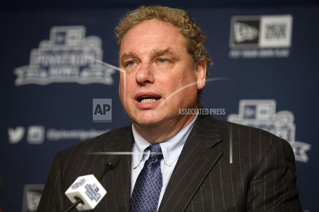 FILE - In this Dec. 9, 2014, file photo, New York Yankees president Randy Levine speaks during a news conference at Yankee Stadium in New York. Yankees President Randy Levine called on the players' association to resume negotiations with Major League Baseball to start the pandemic-delayed season. Levine said the money difference between the feuding sides was not the primary obstacle but rather issues such as health and safety protocols and determining how to deal with a second wave of the new coronavirus. “So what I believe needs to happen is that the parties need to get together as soon as possible to resolve those issues so we can get the season going,” he said Tuesday, June 16, 2020. (AP Photo/John Minchillo, File)