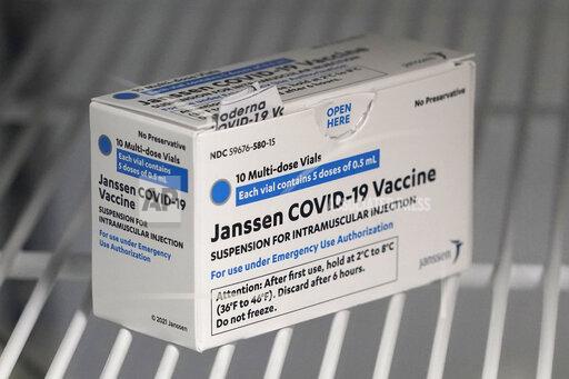 FILE - In this March 25, 2021 file photo, a box of the Johnson & Johnson COVID-19 vaccine is shown in a refrigerator at a clinic in Washington state. A batch of Johnson & Johnson’s COVID-19 vaccine failed quality standards and can’t be used, the drug giant said late Wednesday, March 31, 2021. The drugmaker didn’t say how many doses were lost, and it wasn’t clear how the problem would impact future deliveries. (AP Photo/Ted S. Warren)
