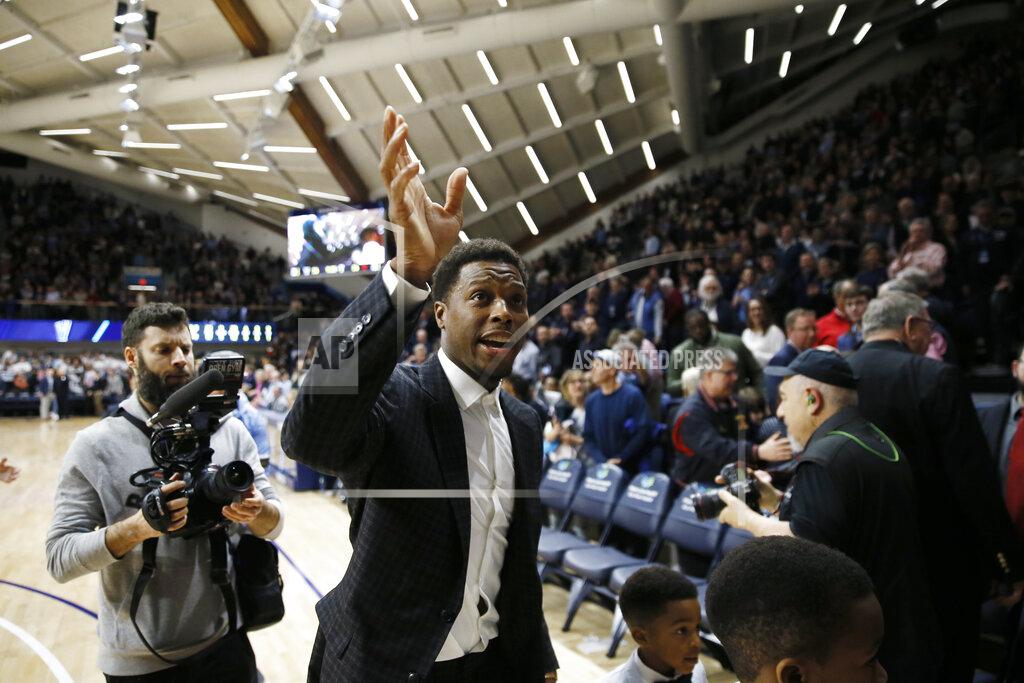 Matt Slocum Kyle Lowry, a former Villanova player and current Toronto Raptors player, waves to the crowd after a ceremony honoring him during an NCAA college basketball game between Villanova and St. John's, Wednesday, Feb. 26, 2020, in Villanova, Pa. (AP Photo/Matt Slocum)