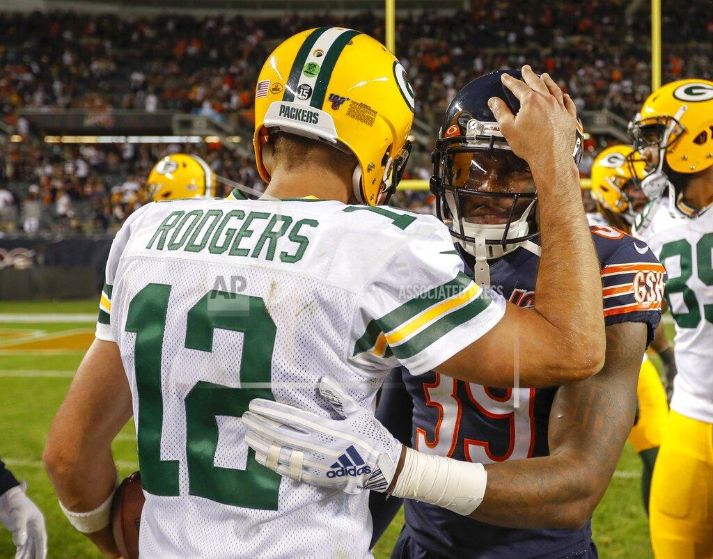 Morry Gash Green Bay Packers' Aaron Rodgers talks to Chicago Bears' Eddie Jackson after an NFL football game against the Chicago Bears Thursday, Sept. 5, 2019, in Chicago. The Packers won 10-3. (AP Photo/Morry Gash)