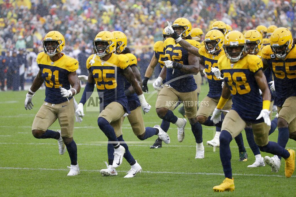 Mike Roemer Members of the Green Bay Packers celebrate after an incomplete pass call was reviewed by officials and ruled an interception by Green Bay Packers defensive back Darnell Savage during the second half of an NFL football game against the Denver Broncos Sunday, Sept. 22, 2019, in Green Bay, Wis. (AP Photo/Mike Roemer)