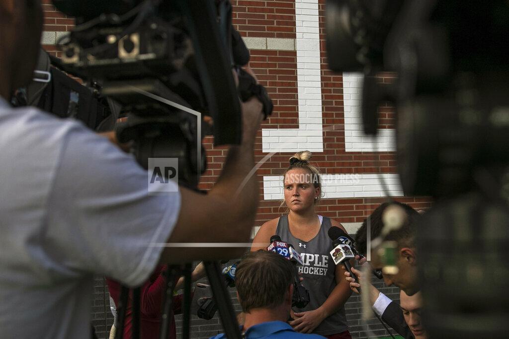 Heather Khalifa Temple University field hockey player Lucy Reed waits to be interviewed at the conclusion of practice at Howarth Field in Philadelphia, Tuesday, Sept. 10, 2019. The team's game at Kent State on Saturday against Maine was cancelled due to pregame football fireworks. After the shock wore off of halting a women's field hockey game in the middle of overtime just so they could shoot off fireworks for a football game that hadn't even started, the captain of the Maine team said it's par for the course when you're a female athlete. Indeed, for all the advances created by Title IX, there's still an awful lot of hearts and minds that still need changing. (Heather Khalifa/The Philadelphia Inquirer via AP)
