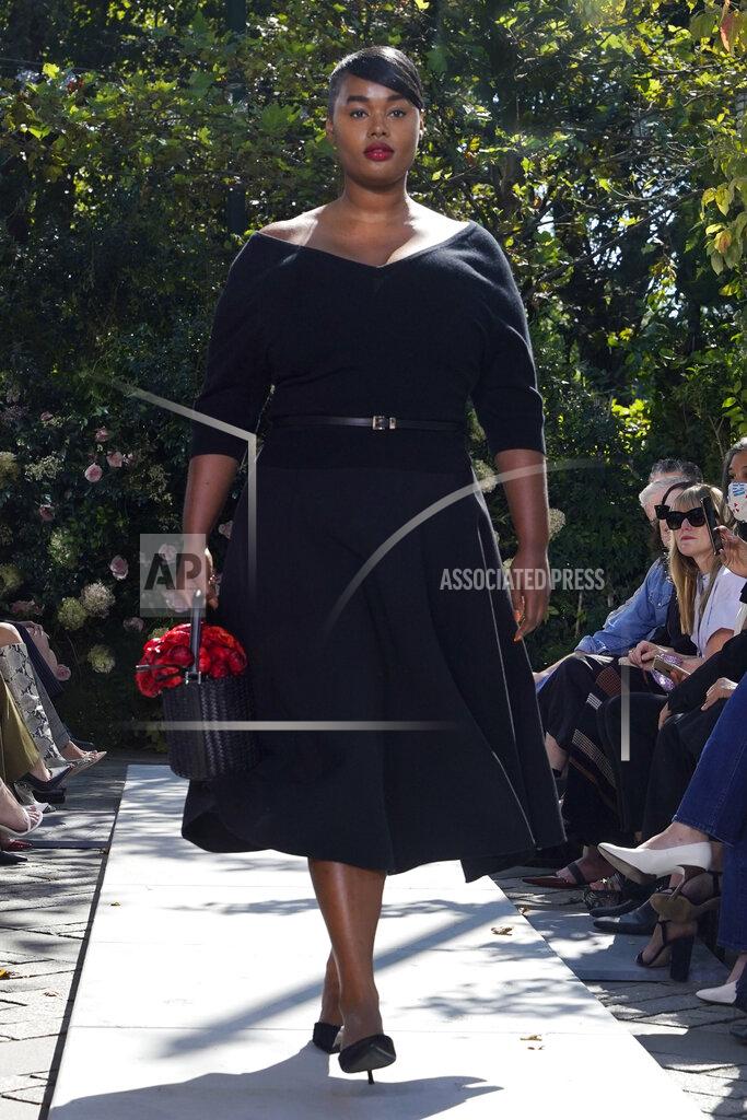 Richard Drew The Michael Kors Spring/Summer 2022 collection is modeled during Fashion Week, in New York, Friday, Sept. 10, 2021. (AP Photo/Richard Drew)
