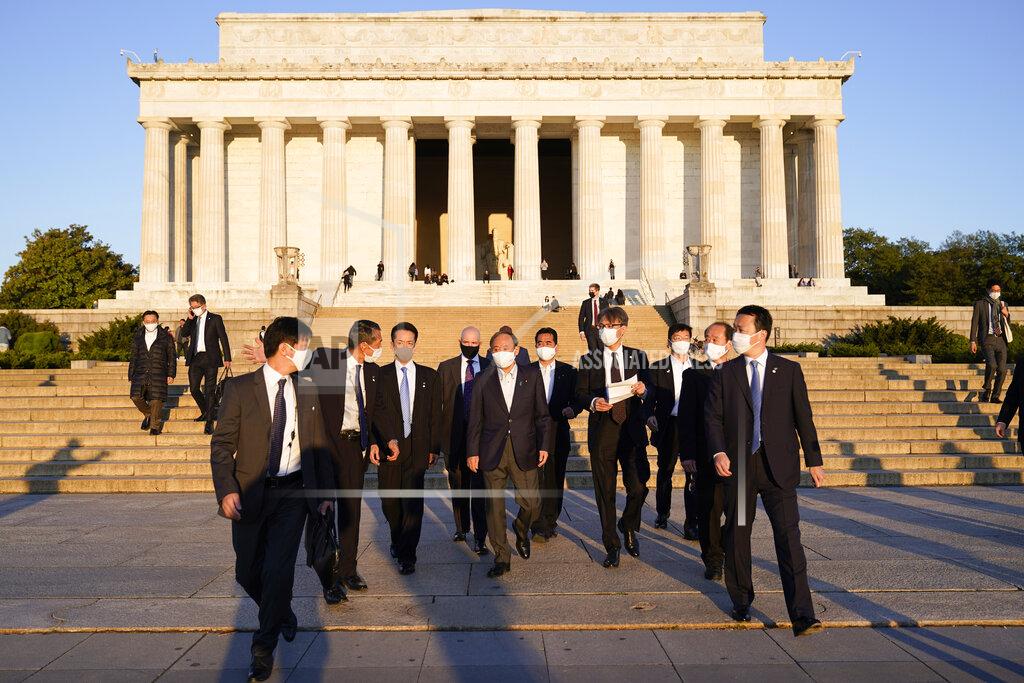 Alex Brandon Japanese Prime Minister Yoshihide Suga visits the Lincoln Memorial, Saturday, April 17, 2021, in Washington. (AP Photo/Alex Brandon)