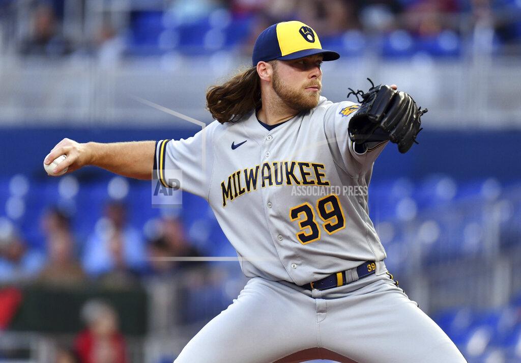 Jim Rassol Milwaukee Brewers pitcher Corbin Burnes throws during the first inning of the team's baseball game against the Miami Marlins, Friday, May 13, 2022, in Miami. (AP Photo/Jim Rassol)