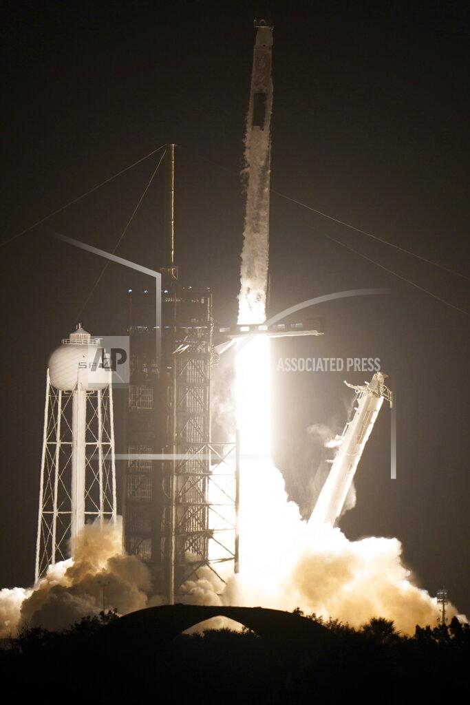 Brynn Anderson A SpaceX Falcon 9 rocket with the Crew Dragon space capsule lifts off from pad 39A at the Kennedy Space Center in Cape Canaveral, Fla., Friday, April 23, 2021. (AP Photo/Brynn Anderson)