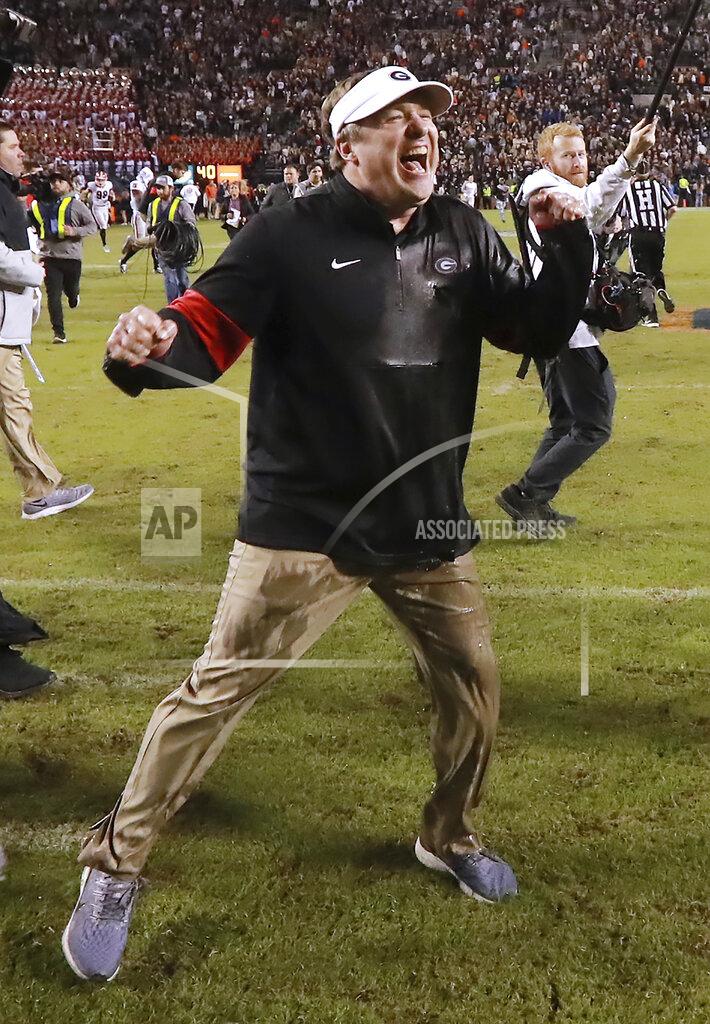 Curtis Compton Georgia head coach Kirby Smart celebrates as time expires for a 21-14 victory over Auburn in an NCAA college football game, Saturday, Nov. 16, 2019, in Auburn, Ala. (Curtis Compton/Atlanta Journal-Constitution via AP)
