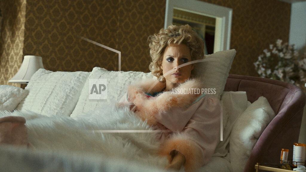 Uncredited This image released by Searchlight Pictures shows Jessica Chastain as Tammy Faye Bakker in a scene from "The Eyes of Tammy Faye." (Searchlight Pictures via AP)