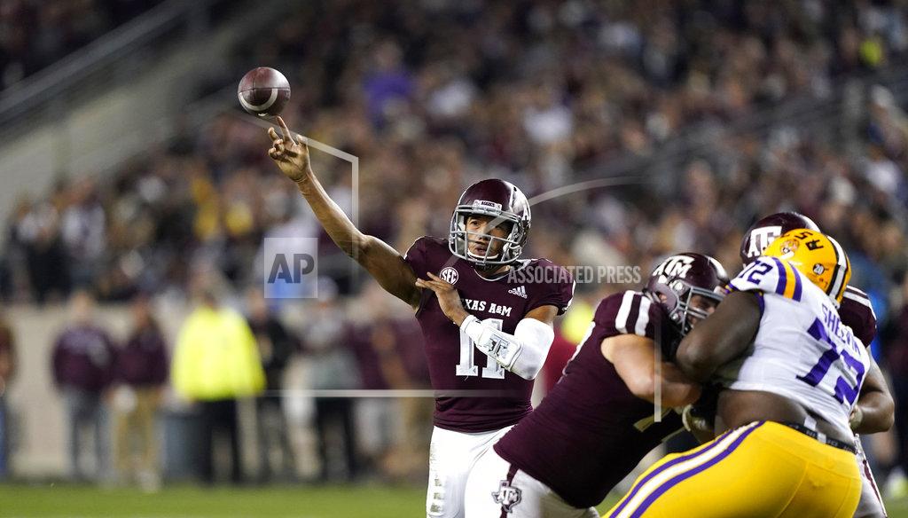 David J. Phillip Texas A&M quarterback Kellen Mond (11) throws a pass against LSU during the second half of an NCAA college football game Saturday, Nov. 24, 2018, in College Station, Texas. Texas A&M won 74-72 in seven overtimes. (AP Photo/David J. Phillip)