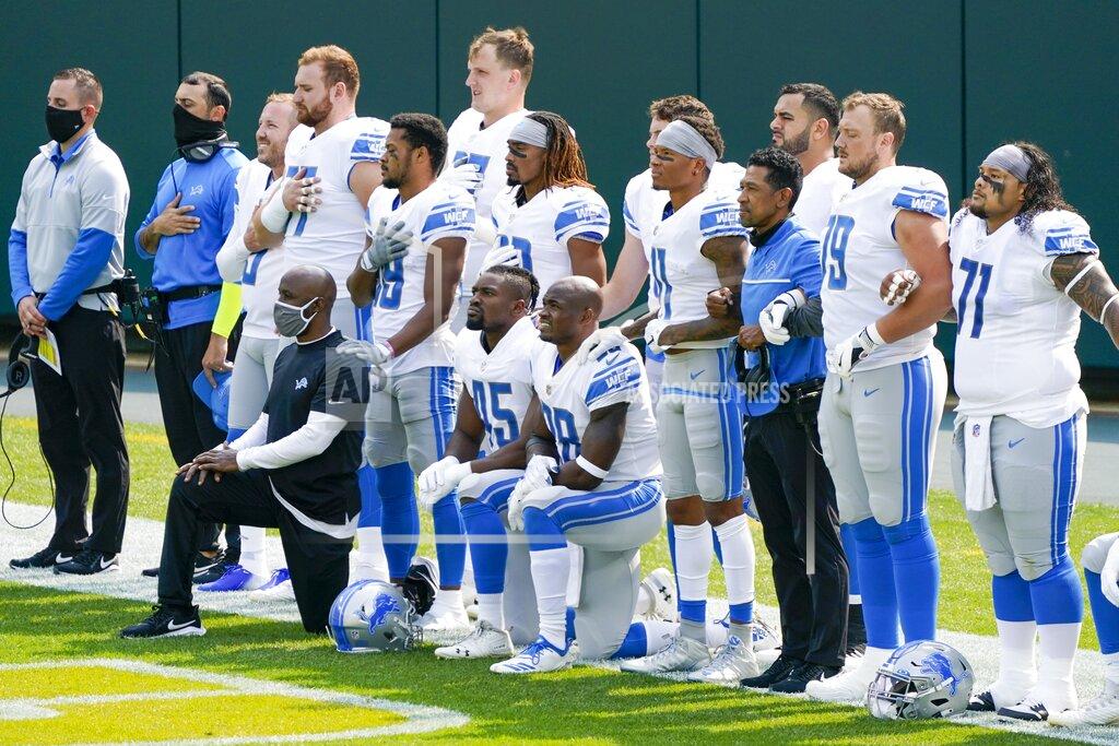 Morry Gash Some Detroit Lions player take a knee during the national anthem before an NFL football game against the Green Bay Packers Sunday, Sept. 20, 2020, in Green Bay, Wis. (AP Photo/Morry Gash)
