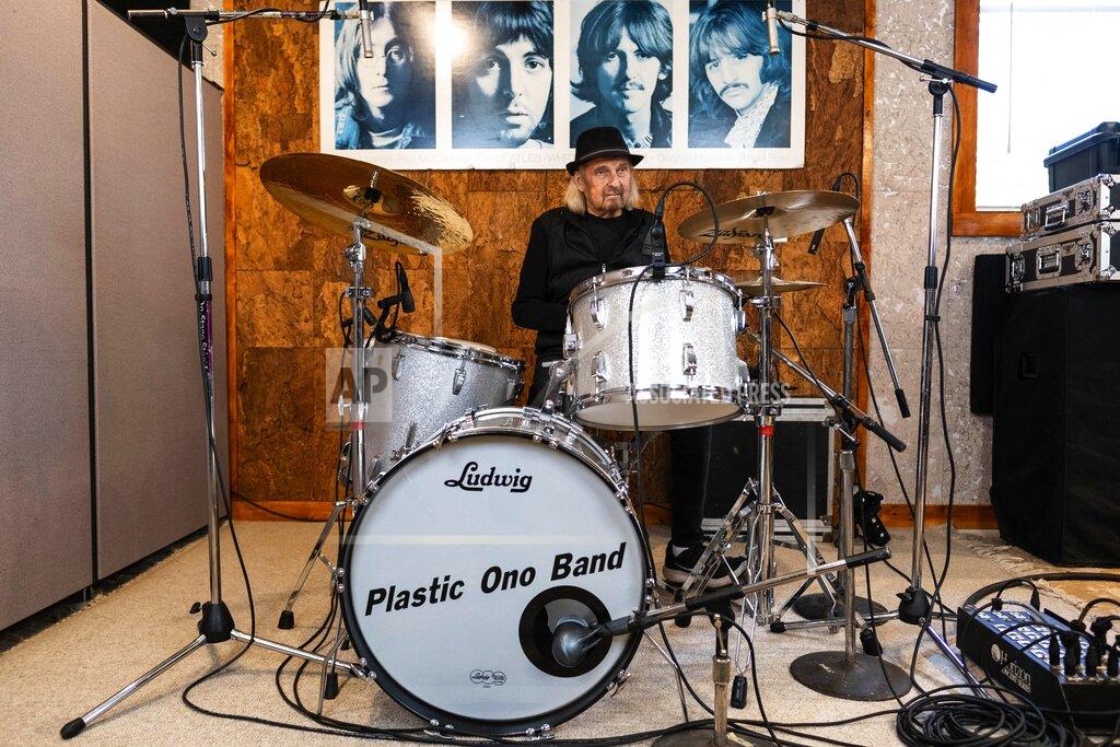 Dean Rutz Drummer Alan White poses his drums in this undated photo. White, the longtime drummer for progressive rock pioneers Yes who also played on projects with John Lennon and George Harrison, has died. He was 72. (Dean Rutz/The Seattle Times via AP)