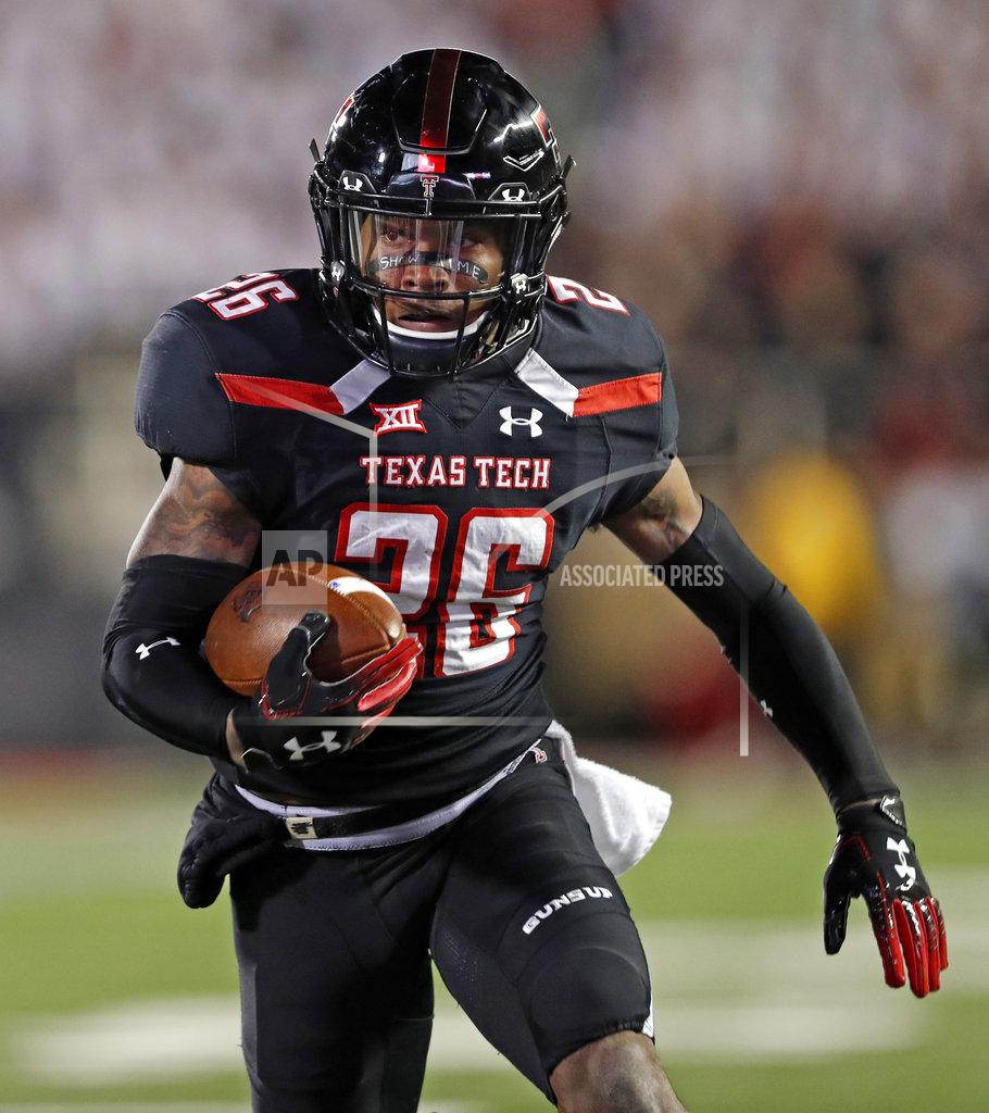 Brad Tollefson Texas Tech's Ta'Zhawn Henry (26) runs the ball to score a touchdown during the first half of an NCAA college football game against Oklahoma, Saturday, Nov. 3, 2018, in Lubbock, Texas. (AP Photo/Brad Tollefson)