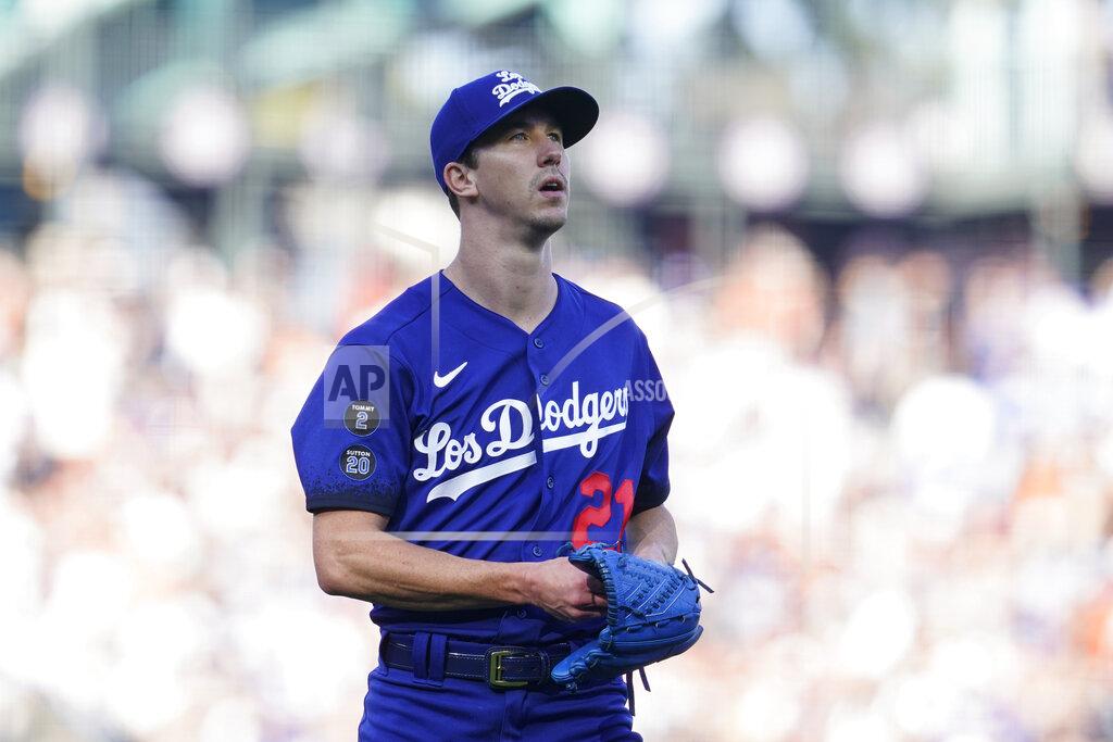 Jeff Chiu Los Angeles Dodgers pitcher Walker Buehler walks to the dugout after the third inning of a baseball game against the San Francisco Giants in San Francisco, Sunday, Sept. 5, 2021. (AP Photo/Jeff Chiu)