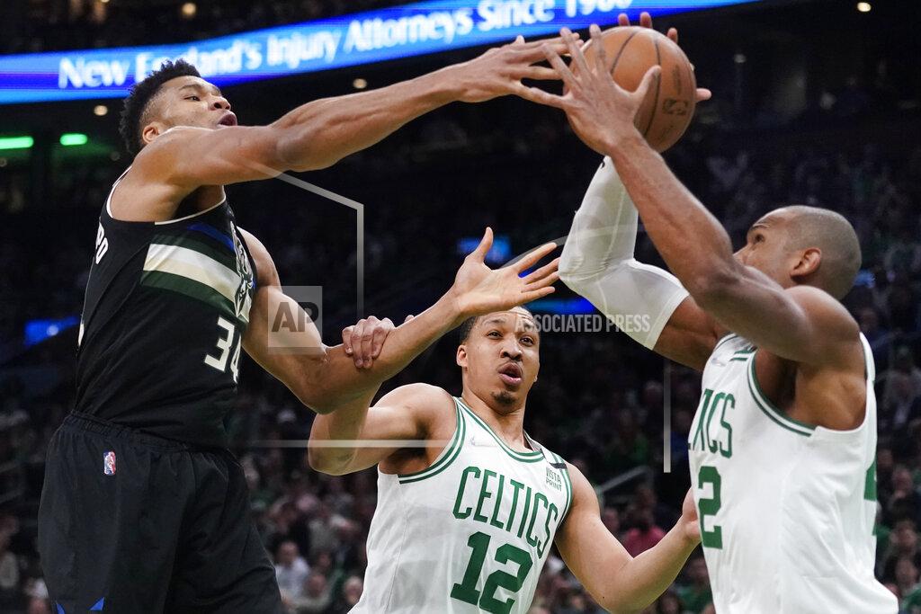 Charles Krupa Milwaukee Bucks forward Giannis Antetokounmpo (34) and Boston Celtics center Al Horford, right, battle for the ball during the first half of Game 5 of an Eastern Conference semifinal in the NBA basketball playoffs, Wednesday, May 11, 2022, in Boston. (AP Photo/Charles Krupa)
