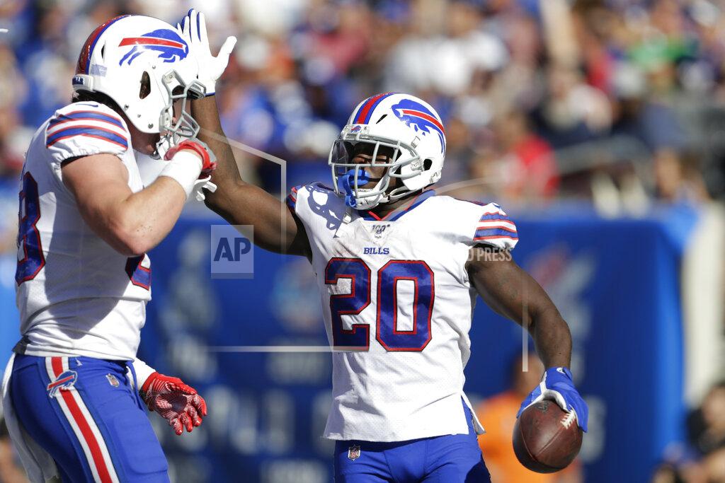 Adam Hunger Buffalo Bills' Frank Gore (20) celebrates his touchdown during the second half of an NFL football game against the New York Giants, Sunday, Sept. 15, 2019, in East Rutherford, N.J. (AP Photo/Adam Hunger)