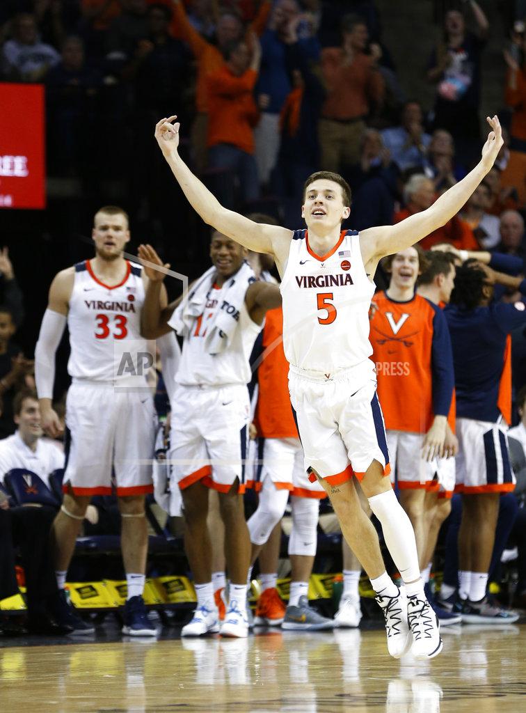 Steve Helber Virginia guard Kyle Guy (5) celebrates a 3-pointer during the first half of an NCAA college basketball game against Florida State in Charlottesville, Va., Saturday, Jan. 5, 2019. (AP Photo/Steve Helber)