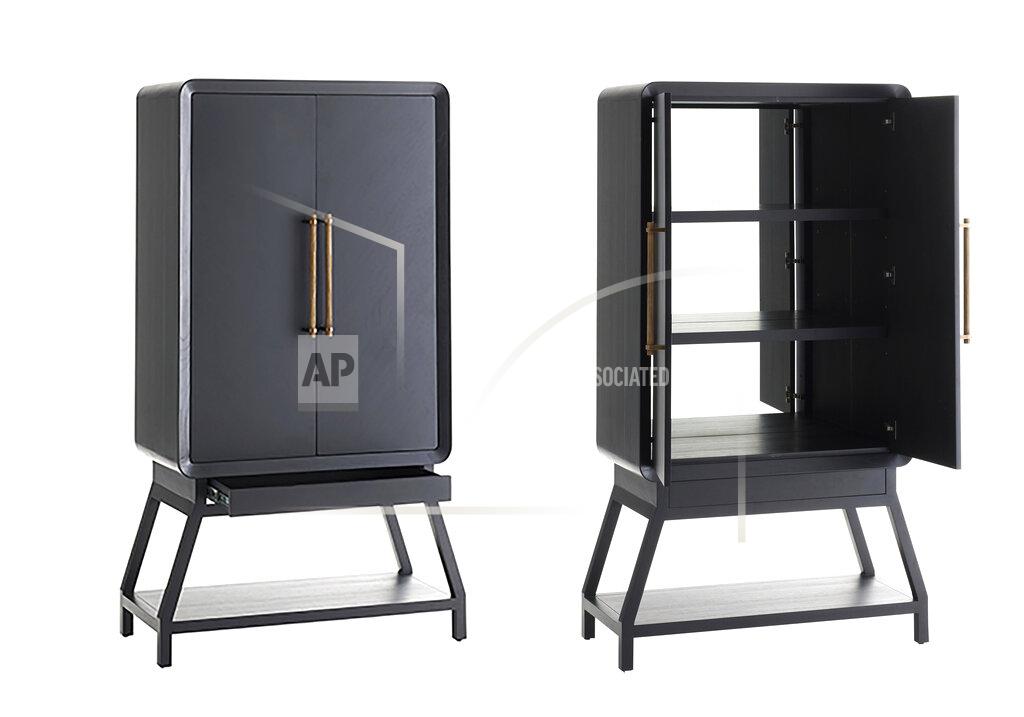 Uncredited This combination of images released by San Francisco interior designer Jay Jeffers shows the Cantu oak cabinet, featuring fluted brass hardware and removable shelves. (Jay Jeffers via AP)
