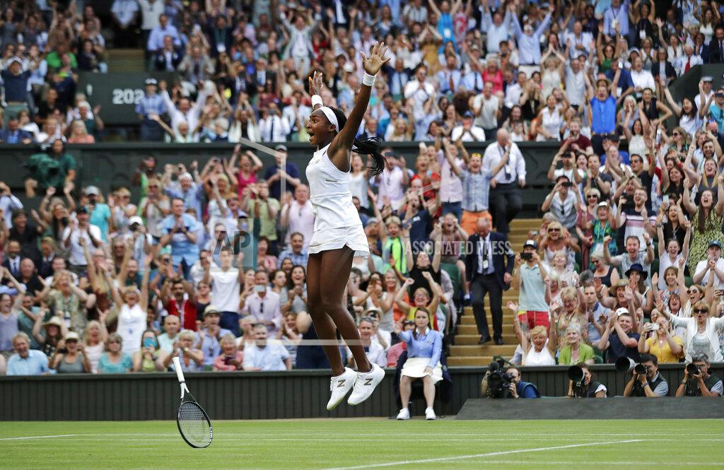 Ben Curtis United States' Cori "Coco" Gauff celebrates after beating Slovenia's Polona Hercog in a women's singles match during day five of the Wimbledon Tennis Championships in London, July 5, 2019. (AP Photo/Ben Curtis)