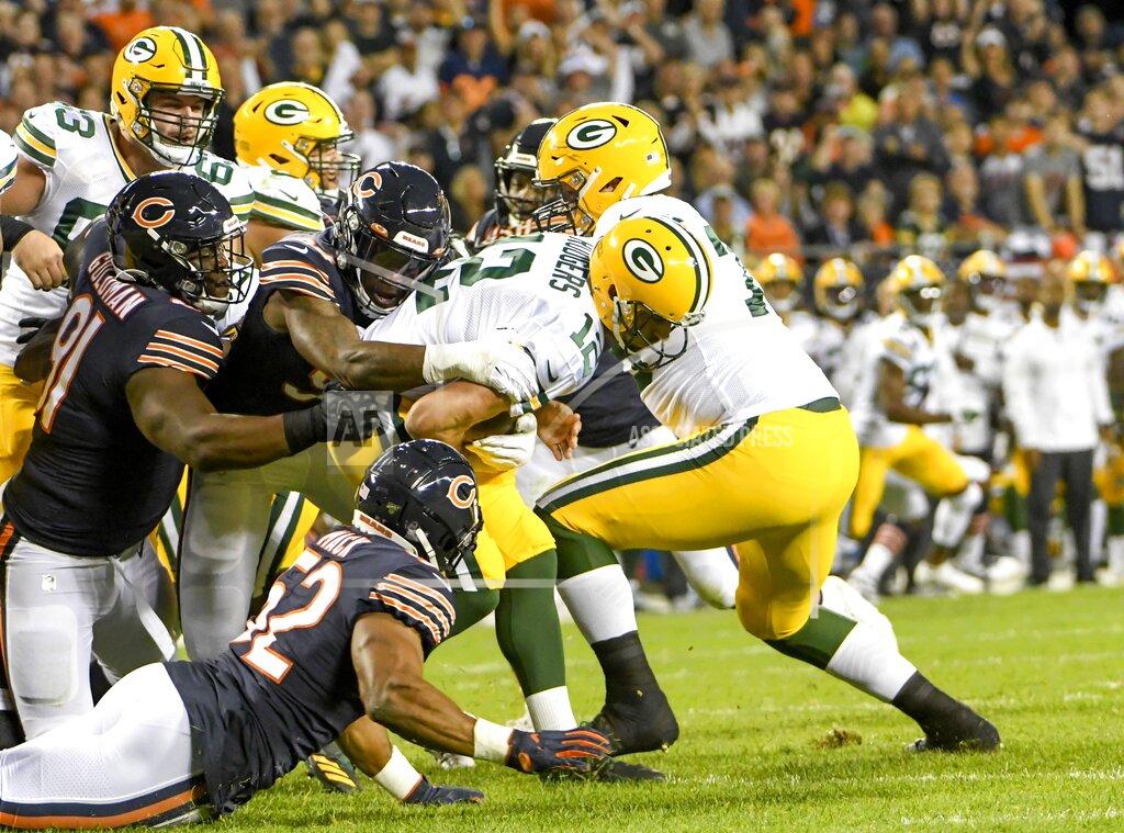 David Banks Green Bay Packers' Aaron Rodgers is sacked by Chicago Bears' Leonard Floyd during the first half of an NFL football game Thursday, Sept. 5, 2019, in Chicago. (AP Photo/David Banks)